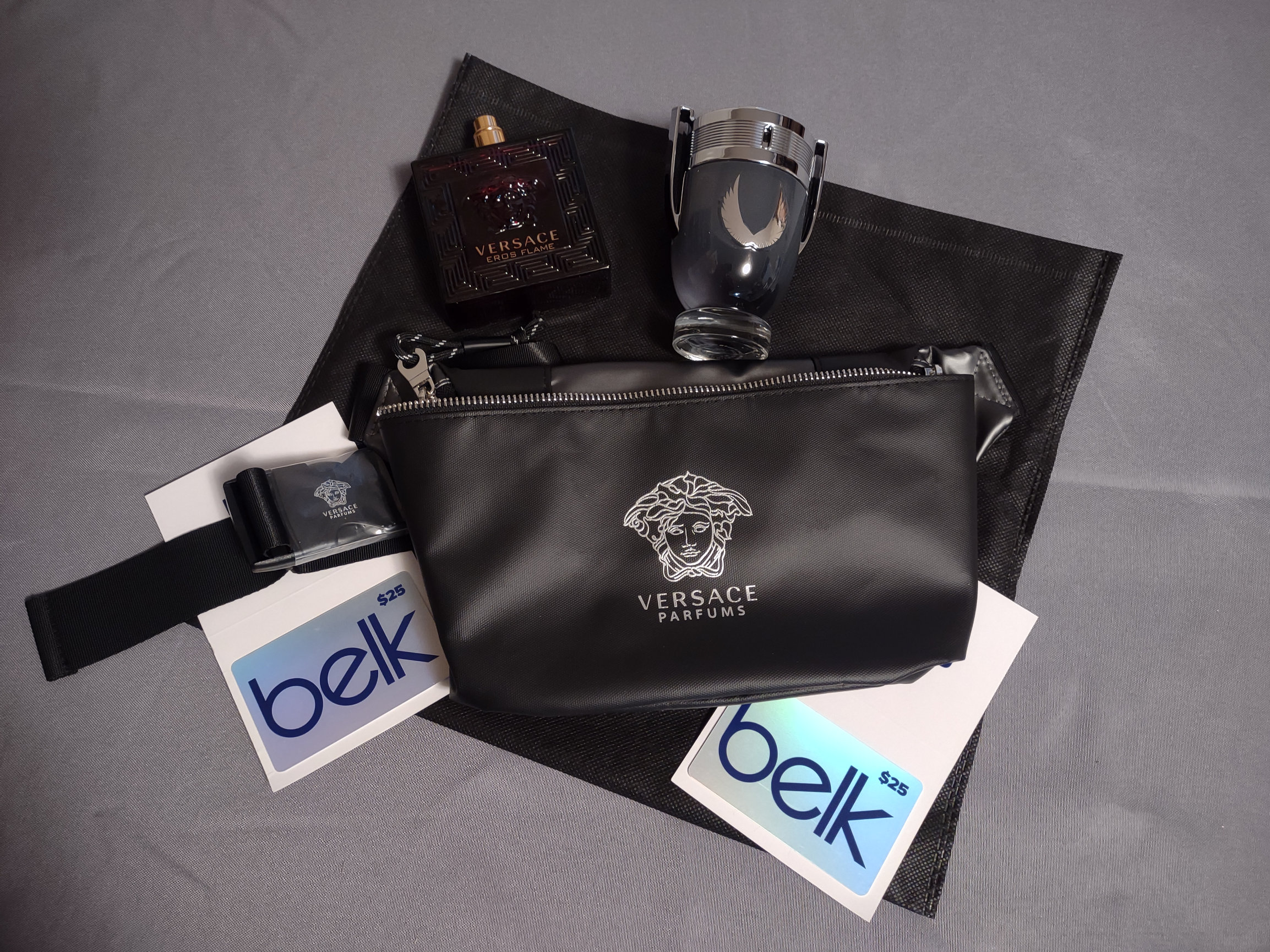 Men's fragrance set with (2) 25 gift cards to Belk RADD, Inc.